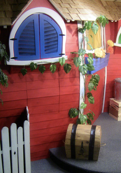 Whimsical house puppet stage